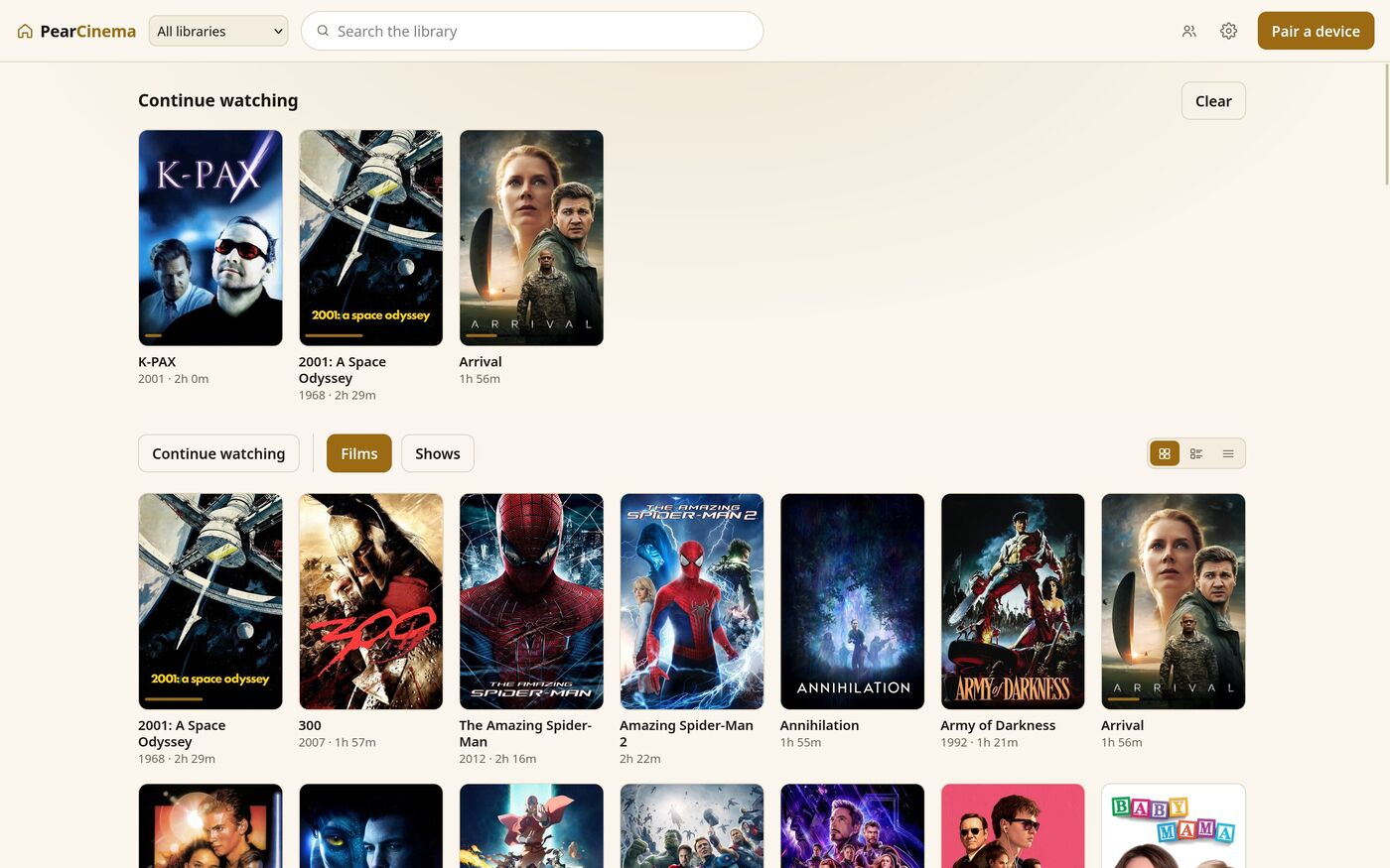 PearCinema library with continue watching and a grid of films